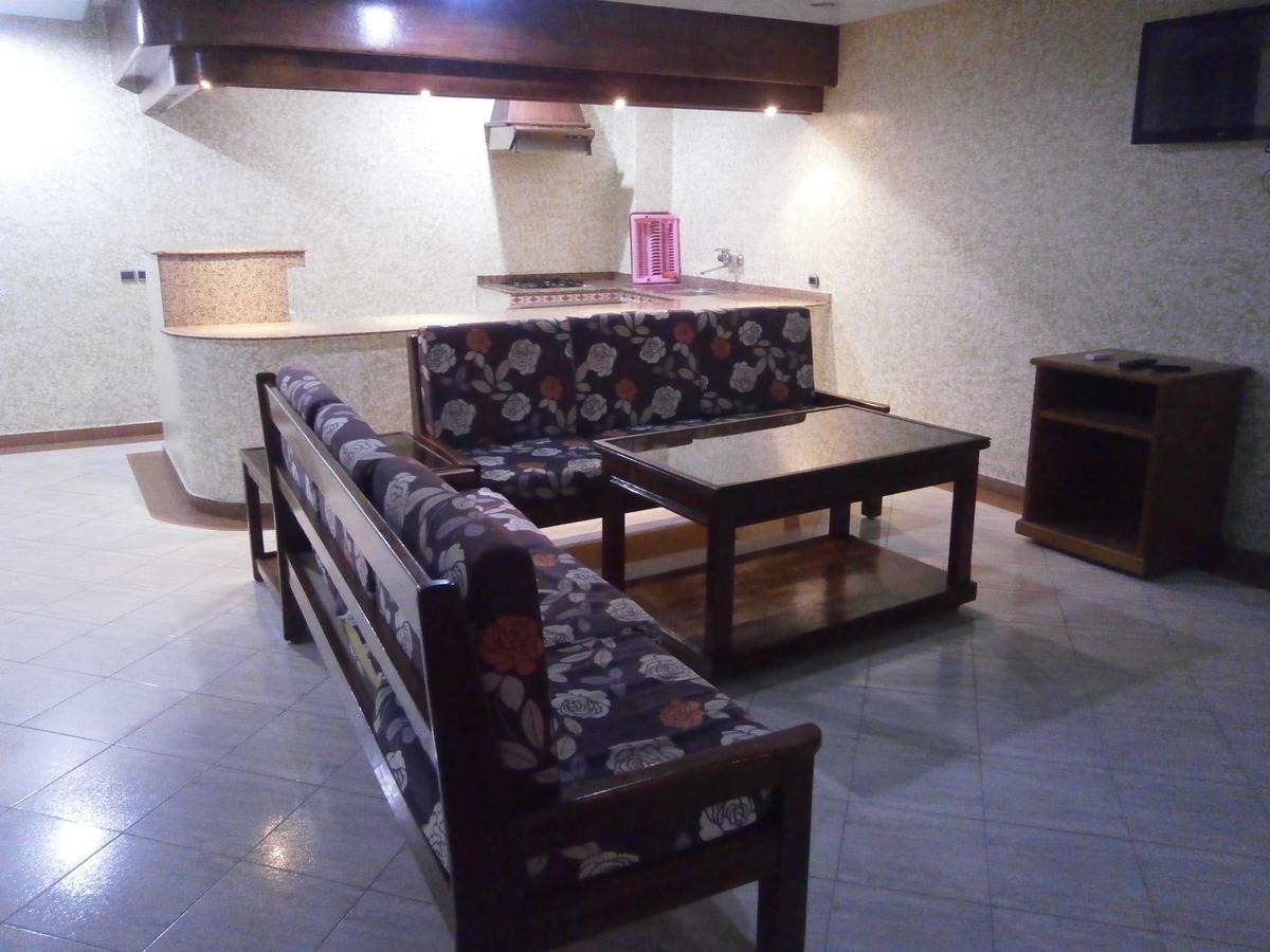 Residence Touristique Ibn Rochd Asilah Bagian luar foto