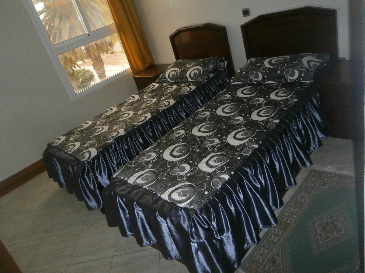 Residence Touristique Ibn Rochd Asilah Bagian luar foto